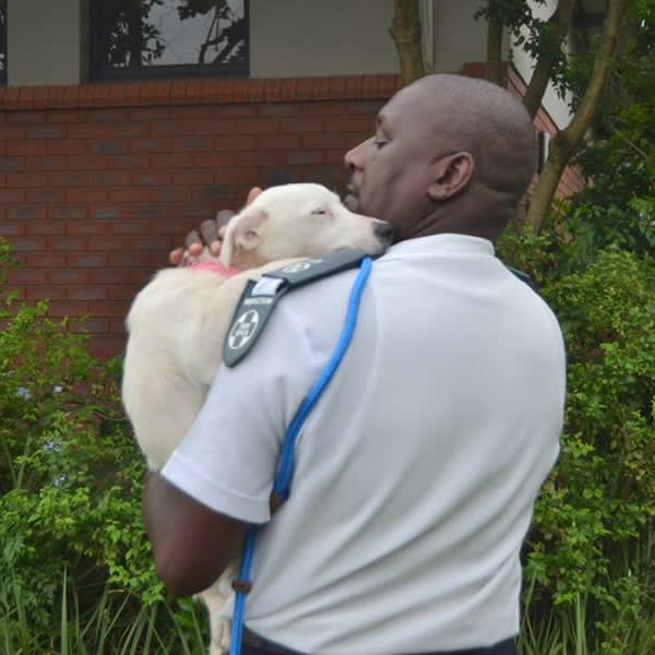 SPCA inspector with rescued dog